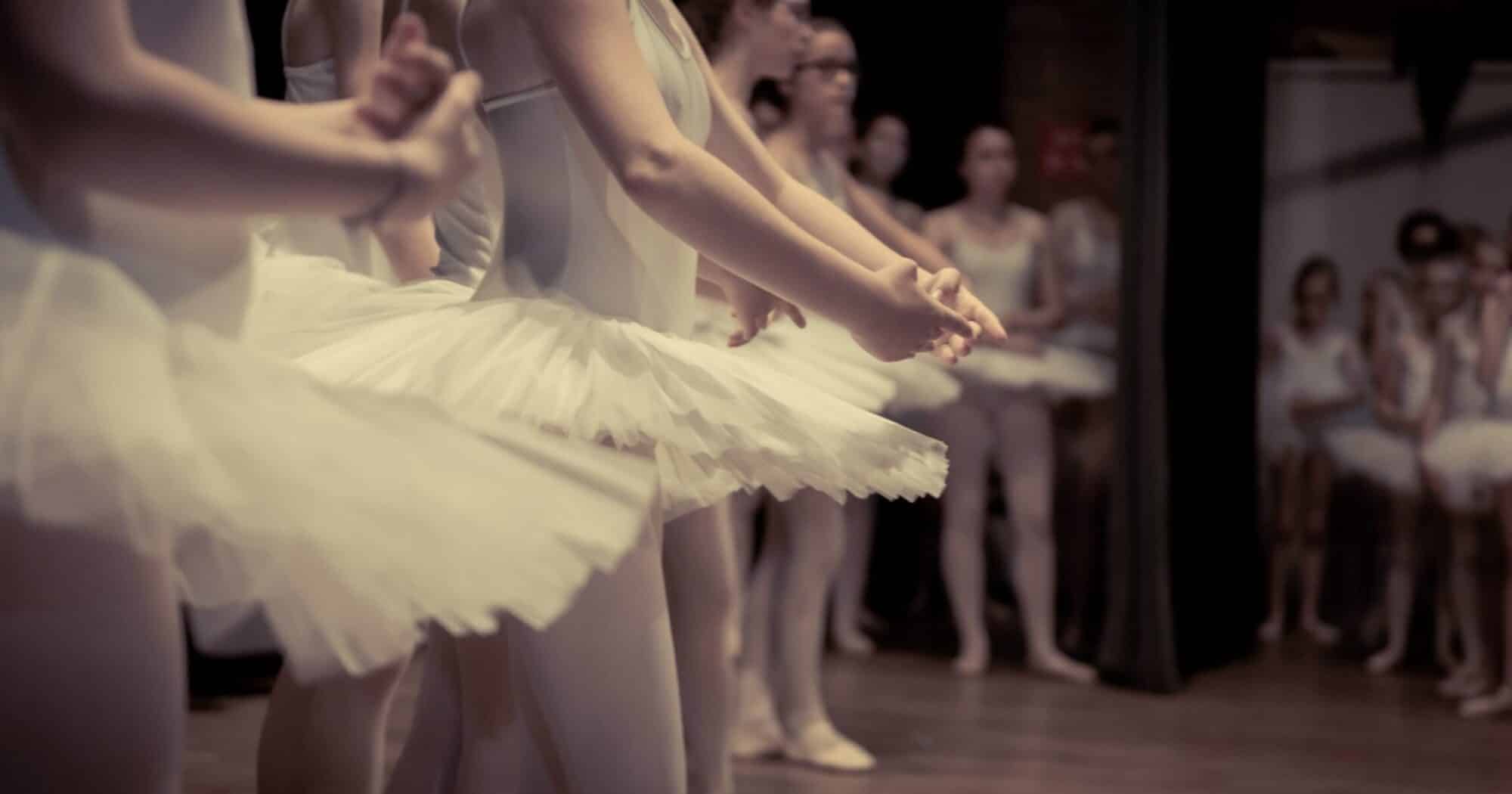 Young dancers practicing in a ballet class.